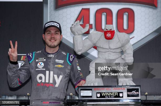 Alex Bowman, driver of the Ally Chevrolet, celebrates his win during the NASCAR Cup Series Drydene 400 at Dover International Speedway on May 16,...