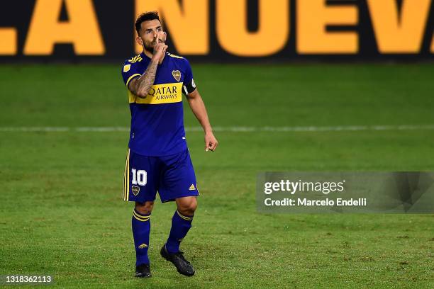 Carlos Tévez of Boca Juniors celebrates after scoring a goal during a penalty shoot out as part of a quarter final match of Copa De La Liga...