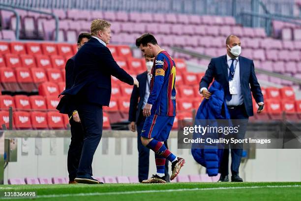Lionel Messi of FC Barcelona leaves the pitch at the end of the La Liga Santander match between FC Barcelona and RC Celta at Camp Nou on May 16, 2021...