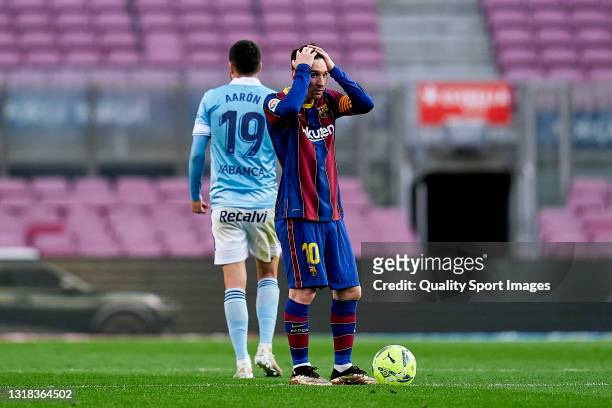 Lionel Messi of FC Barcelona reacts after his team conceding the second goal during the La Liga Santander match between FC Barcelona and RC Celta at...
