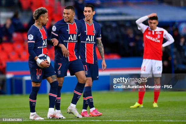 Neymar Jr, Kylian Mbappe and Angel Di Maria of Paris Saint-Germain react before a penalty kick during the Ligue 1 match between Paris Saint-Germain...