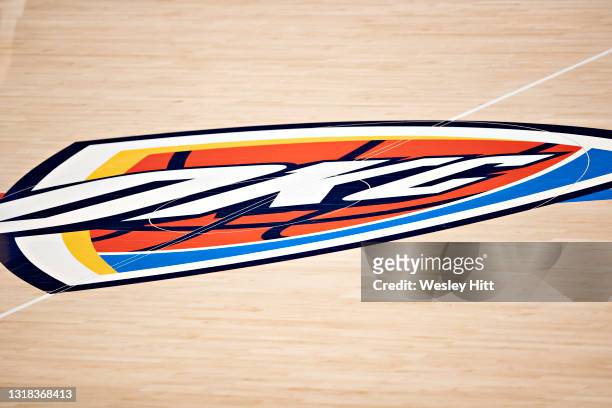 The center logo for the Oklahoma City Thunder is shown before a game against the Los Angeles Clippers at Chesapeake Energy Arena on May 16, 2021 in...
