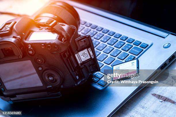 digital photography workstation. modern digital dslr camera, laptop computer and display. - digital camera stock pictures, royalty-free photos & images