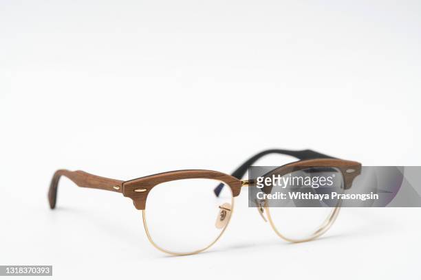 eyeglasses wood isolated on white. - accesorio para ojos fotografías e imágenes de stock