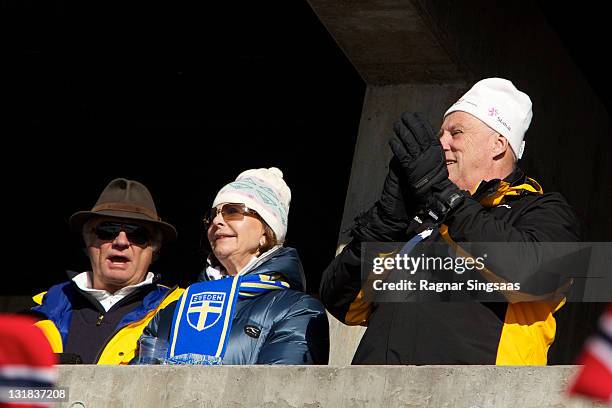 King Carl XVI Gustaf of Sweden, Queen Silvia of Sweden and King Harald V of Norway attend the Ladie's 30km Mass Start Free in the FIS Nordic World...