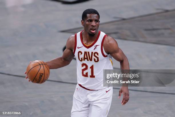 Damyean Dotson of the Cleveland Cavaliers dribbles during the second half against the Brooklyn Nets at Barclays Center on May 16, 2021 in the...