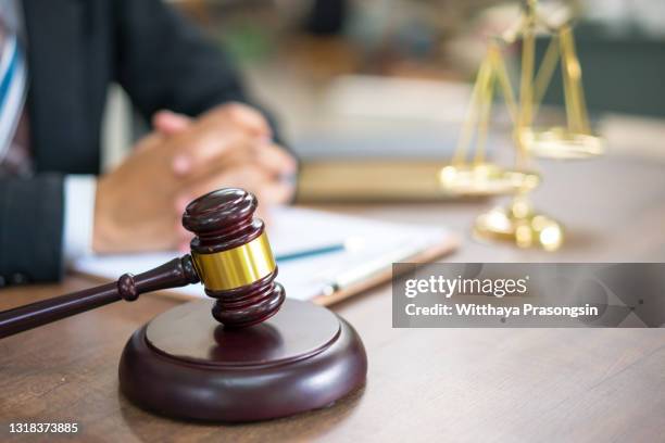 lawyer working with gavel - lawyer stock-fotos und bilder