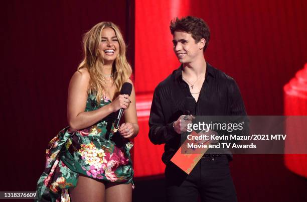 Addison Rae and Tanner Buchanan speak onstage during the 2021 MTV Movie & TV Awards at the Hollywood Palladium on May 16, 2021 in Los Angeles,...