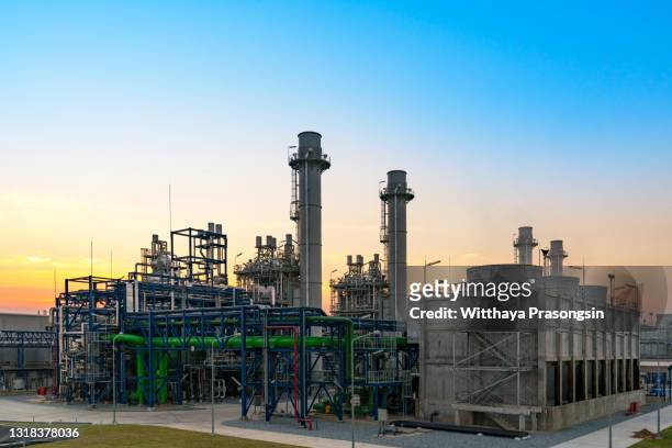 gas turbine electrical power plant at dusk with blue hour. - gas works stock pictures, royalty-free photos & images