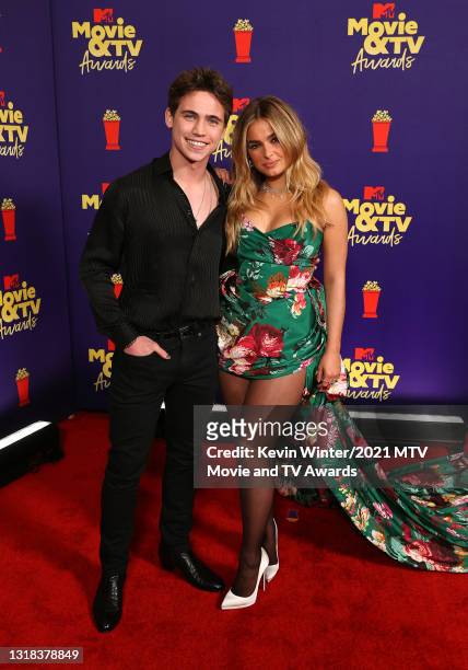 Tanner Buchanan and Addison Rae pose backstage during the 2021 MTV Movie & TV Awards at the Hollywood Palladium on May 16, 2021 in Los Angeles,...