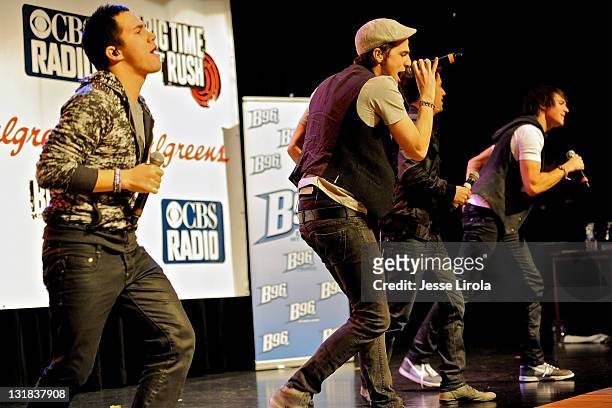 Carlos Pena, Kendall Schmidt, Logan Henderson and James Maslow of Big Time Rush perform at Sycamore High School on October 29, 2010 in Sycamore,...