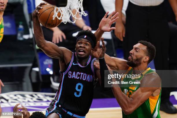 Terence Davis of the Sacramento Kings goes up for a layup against Rudy Gobert of the Utah Jazz during the second quarter at Golden 1 Center on May...