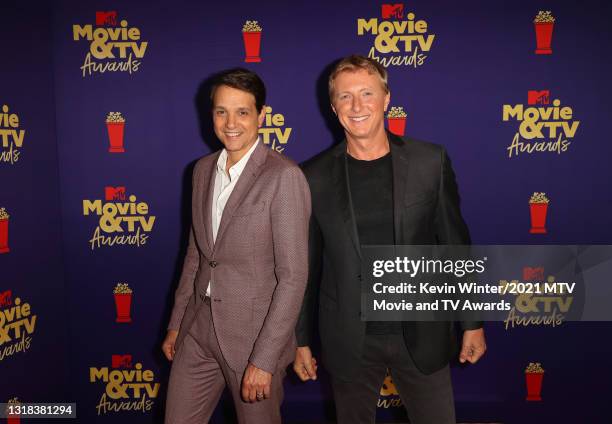 Ralph Macchio and William Zabka pose backstage during the 2021 MTV Movie & TV Awards at the Hollywood Palladium on May 16, 2021 in Los Angeles,...