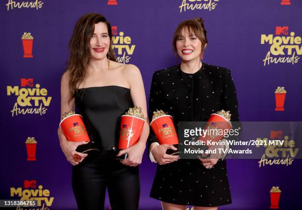 Kathryn Hahn and Elizabeth Olsen pose backstage with the four awards won for 'WandaVision.' The show was awarded Best Performance in a Show ; Best...