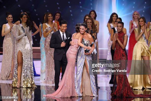 Olivia Culpo, Mario Lopez, Miss Universe Bolivia Lenka Nemer and Miss Universe 2019 Zozibini Tunzi speak onstage at the 69th Miss Universe...