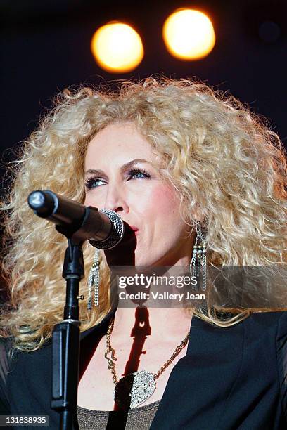 Kimberly Schlapman of Little Big Town performs at the Bud Light Orange Bowl Game Day Fan Zone during the 2011 Discover Orange Bowl game Stanford...