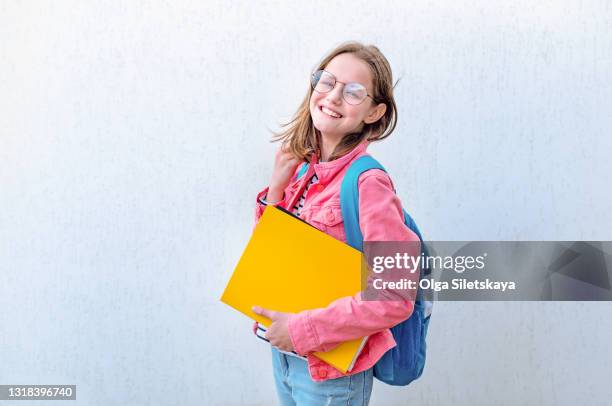 teenage girls with backpack - pretty girls with glasses stock pictures, royalty-free photos & images