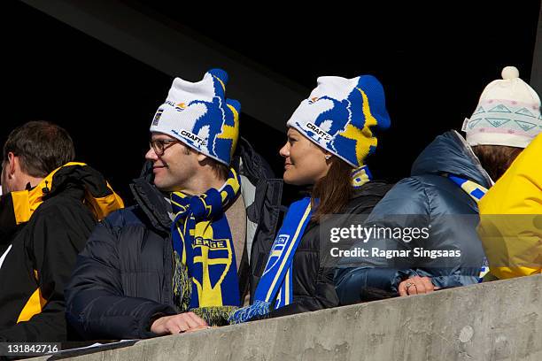 Prince Daniel of Sweden and Princess Victoria of Sweden attend the Ladie's 30km Mass Start Free in the FIS Nordic World Ski Championships 2011 at...