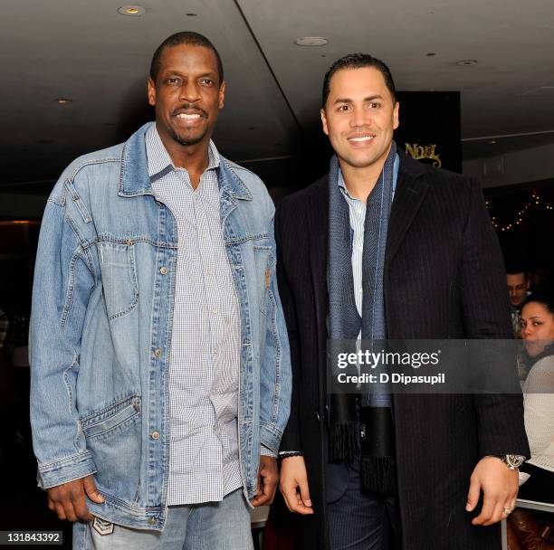 Dwight "Doc" Gooden and New York Mets player and Sofrito co-owner Carlos Beltran at Sofrito on December 14, 2010 in New York City.