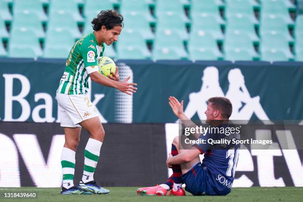 Diego Lainez of Real Betis reacts during the La Liga Santander match between Real Betis and SD Huesca at Estadio Benito Villamarin on May 16, 2021 in...