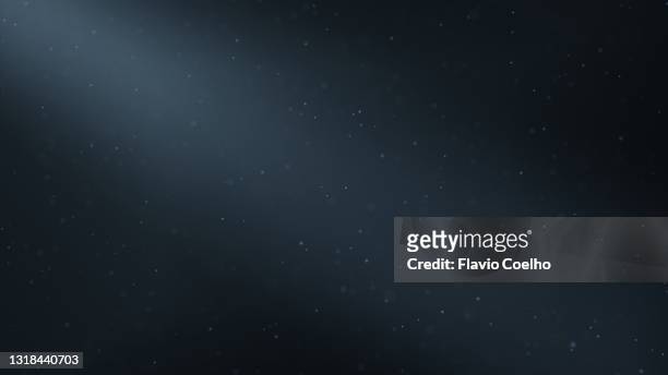 dust particles floating in the air background - lighting equipment stock pictures, royalty-free photos & images