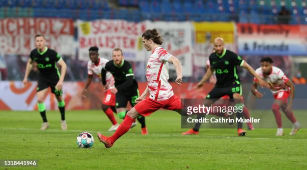 Marcel Sabitzer of RB Leipzig scores their side's second goal from the penalty spot during the Bundesliga match between RB Leipzig and VfL Wolfsburg...