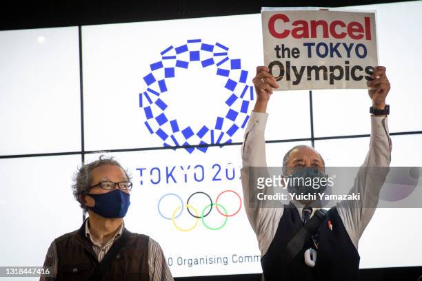 Protester holds a placard during a protest against the Tokyo Olympics on May 17, 2021 in Tokyo, Japan. With less than 3 months remaining until the...