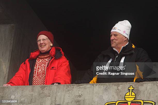 Queen Margrethe II of Denmark and King Harald V of Norway attend the Ladie's Relay 4x5km Classic/Free in the FIS Nordic World Ski Championships 2011...
