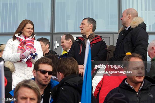 Mari Kiviniemi, Jens Stoltenberg and Fredrik Reinfeldt attend the Ladie's Relay 4x5km Classic/Free in the FIS Nordic World Ski Championships 2011 at...