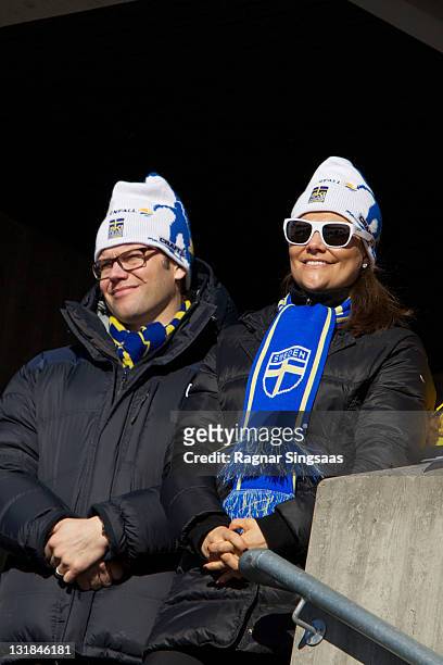 Prince Daniel of Sweden and Princess Victoria of Sweden attend the Ladie's 30km Mass Start Free in the FIS Nordic World Ski Championships 2011 at...