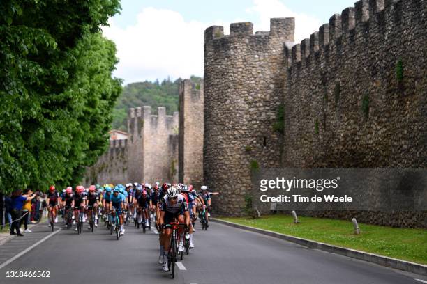 Max Walscheid of Germany and Team Qhubeka Assos leads & The peloton passing through the wall in Rieti village landscape during the 104th Giro...
