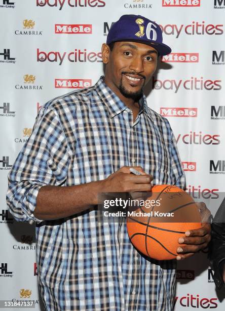 Lakers basketball player Ron Artest signs autographs at the Bay Cities Kitchens Grand Opening at Bay Cities Kitchens and Appliances on November 22,...