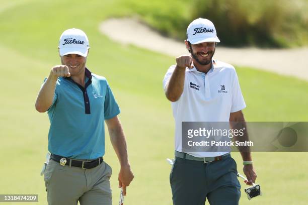 Justin Thomas of the United States and Max Homa of the United States react during a practice round prior to the 2021 PGA Championship at Kiawah...
