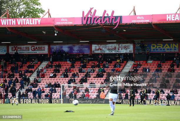 Fans are seen social distancing inside the stadium prior to during the Sky Bet Championship Play-off Semi Final 1st Leg match between AFC Bournemouth...