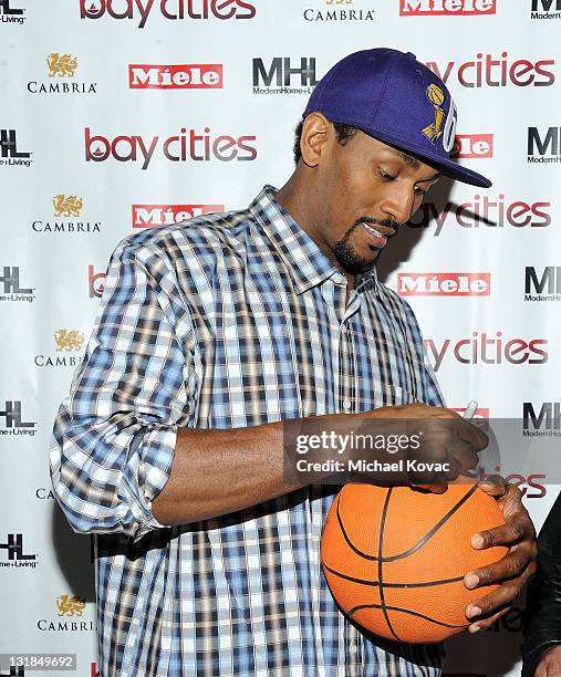 Lakers basketball player Ron Artest signs autographs at the Bay Cities Kitchens Grand Opening at Bay Cities Kitchens and Appliances on November 22,...