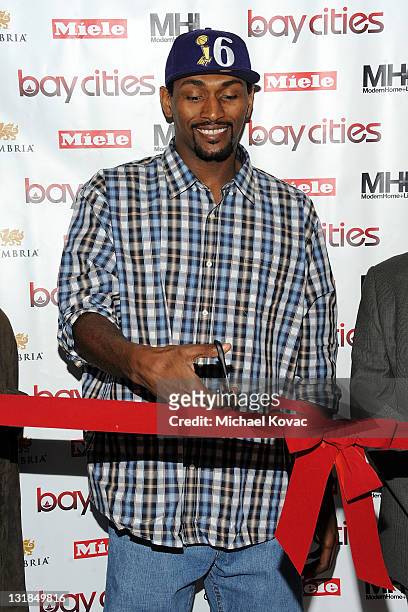 Lakers basketball player Ron Artest cuts the ribbon at the Bay Cities Kitchens Grand Opening at Bay Cities Kitchens and Appliances on November 22,...