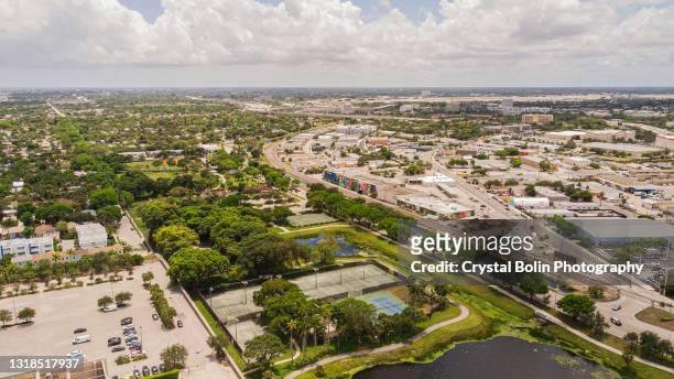 aerial drone footage of downtown west palm beach, florida from okeechobee blvd. & parker ave. in may of 2021 - palm beach florida stock pictures, royalty-free photos & images