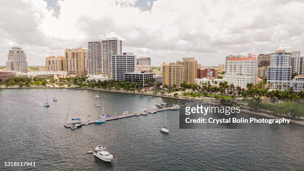 aerial view of downtown west palm beach, florida inlet waterfront & skyline in may of 2021 - west palm beach stock pictures, royalty-free photos & images