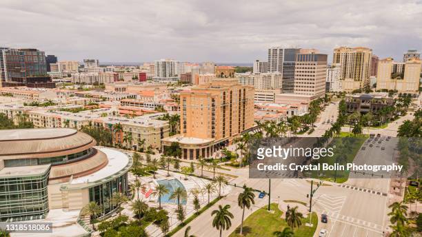 aerial drone footage of downtown west palm beach, florida from okeechobee blvd. & parker ave. in may of 2021 - west palm beach stock pictures, royalty-free photos & images