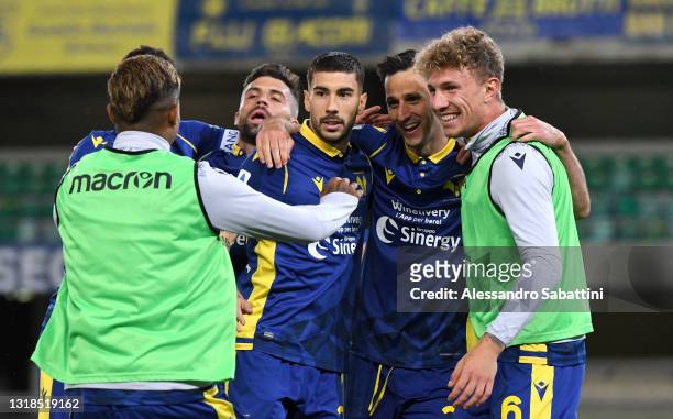 Nikola Kalinic of Hellas Verona F.C. Celebrates with his team mates after scoring his team's second goal during the Serie A match between Hellas...