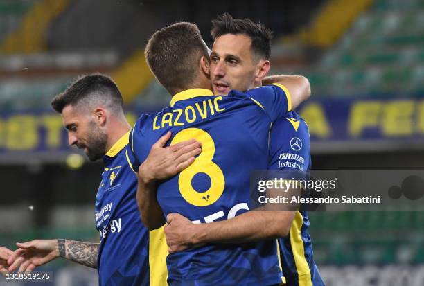 Nikola Kalinic of Hellas Verona F.C. Celebrates with Darko Lazovic after scoring his team's second goal during the Serie A match between Hellas...