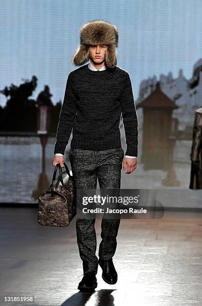 Model walks the runway during the Ermenegildo Zegna show during Milan Fashion Week Menswear Autumn/Winter 2011 on January 15, 2011 in Milan, Italy.