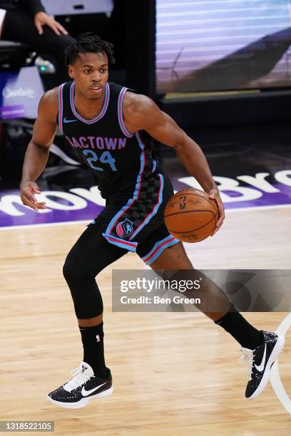 Buddy Hield of the Sacramento Kings dribbles against the Utah Jazz at Golden 1 Center on May 16, 2021 in Sacramento, California. NOTE TO USER: User...