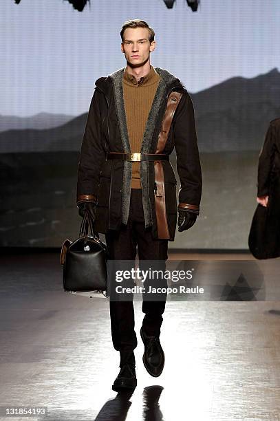 Model walks the runway during the Ermenegildo Zegna show during Milan Fashion Week Menswear Autumn/Winter 2011 on January 15, 2011 in Milan, Italy.