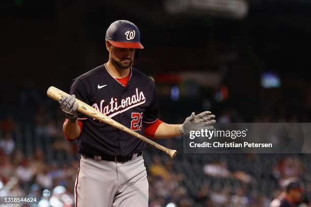 Jordy Mercer of the Washington Nationals strikes out against the Arizona Diamondbacks during the MLB game at Chase Field on May 16, 2021 in Phoenix,...