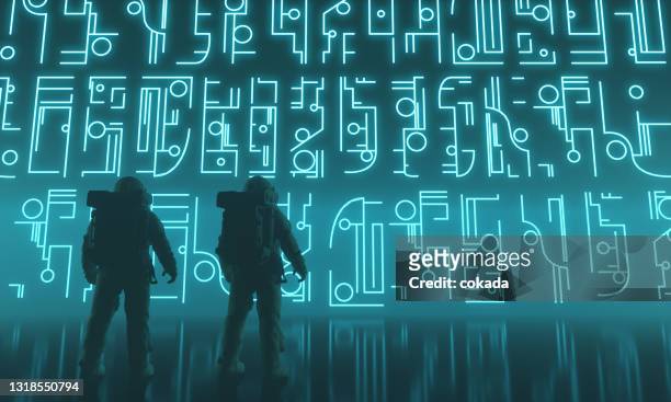 astronauts discovering alien civilization sign - alien stock pictures, royalty-free photos & images