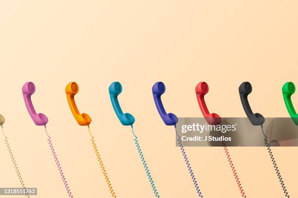 a group of coloured phones - j pop stock-fotos und bilder