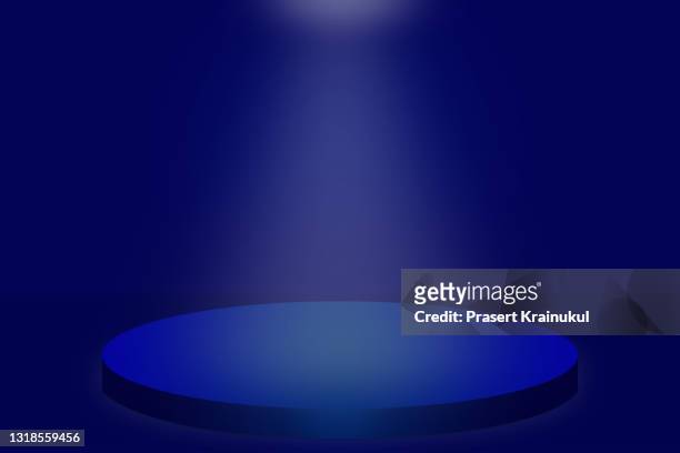 blue round stage background with downlight, dark background - winners podium stockfoto's en -beelden
