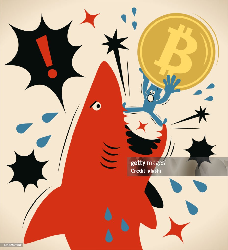 The businessman carrying a big Bitcoin Cryptocurrency is getting attacked by a shark