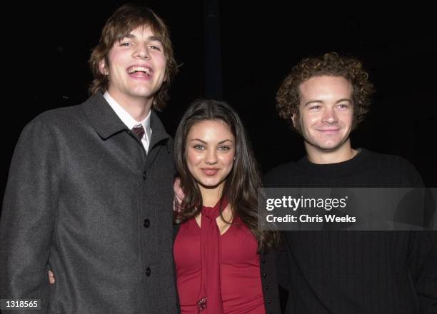 From left to right, "That 70''s Show" cast members Ashton Kutcher, Mila Kunis, and Danny Masterson arrive at the premiere of USA Films'' "Traffic"...